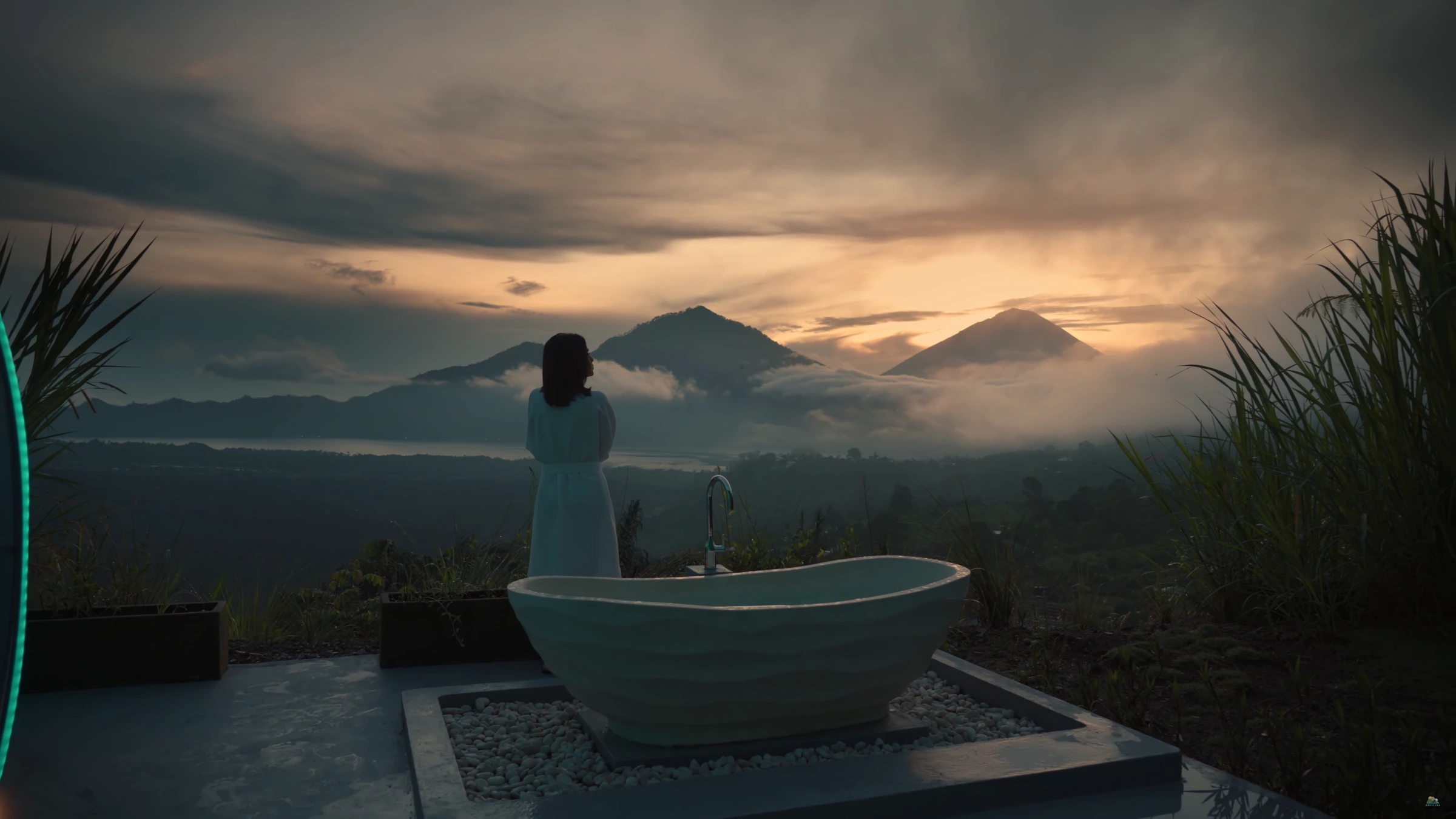 Private hot jacuzzi at Crystal Nest Suites overlooking the Kintamani highlands at sunrise.